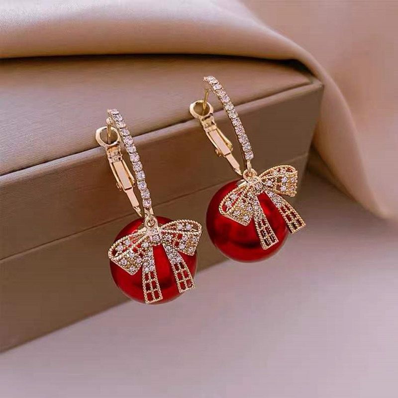 Red big pearl bow earring Buy Earrings Online in India | Stylish Earrings for Women & Girls | Korean, Daily Wear, Party Wear, Budget & Premium Jewellery | Oora by Zivya