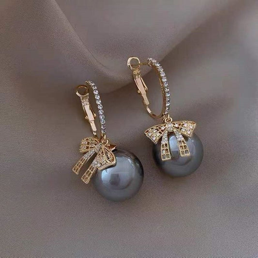grey big pearl bow earring Buy Earrings Online in India | Stylish Earrings for Women & Girls | Korean, Daily Wear, Party Wear, Budget & Premium Jewellery | Oora by Zivya